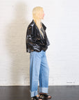 Cropped Asymmetrical Jacket in Crushed Patent Black by Planet-Planet-Idlewild-Cincinnati