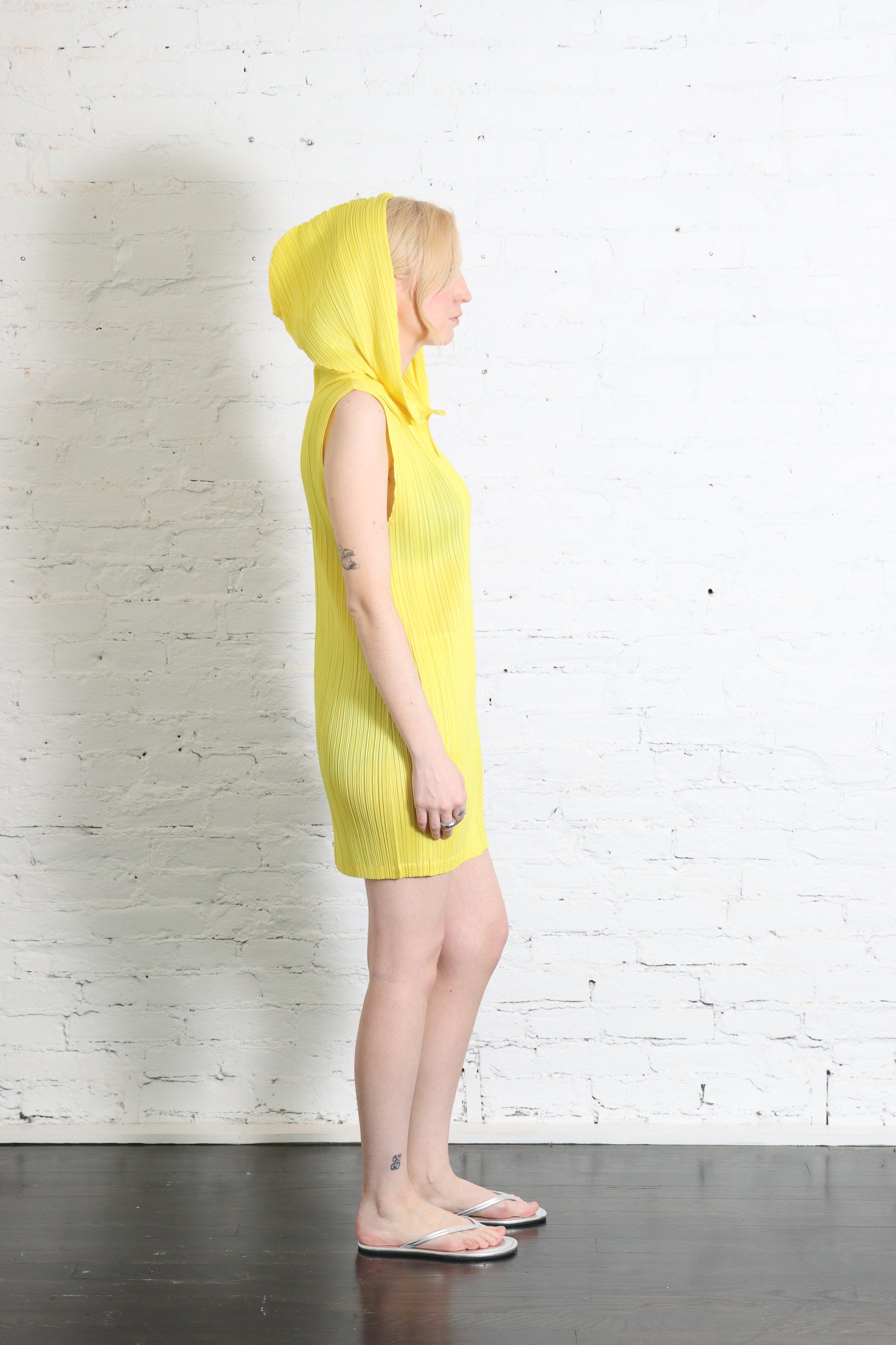 April Monthly Colors Zip-up Sleeveless Top in Yellow by Pleats Please