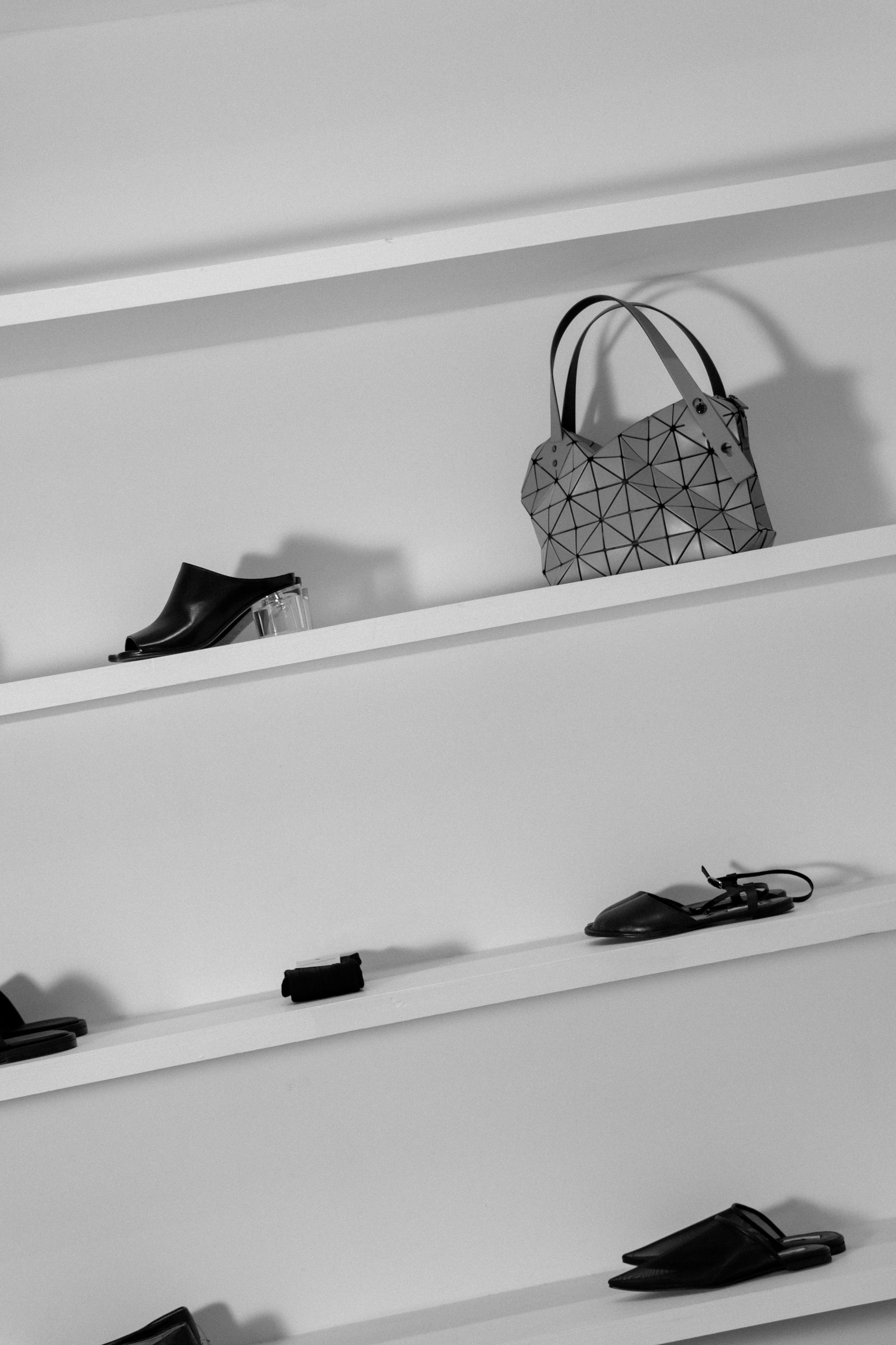 Interior of FORM by Idlewild OTR, featuring sculptural designer shoes and avant-garde fashion in Cincinnati.