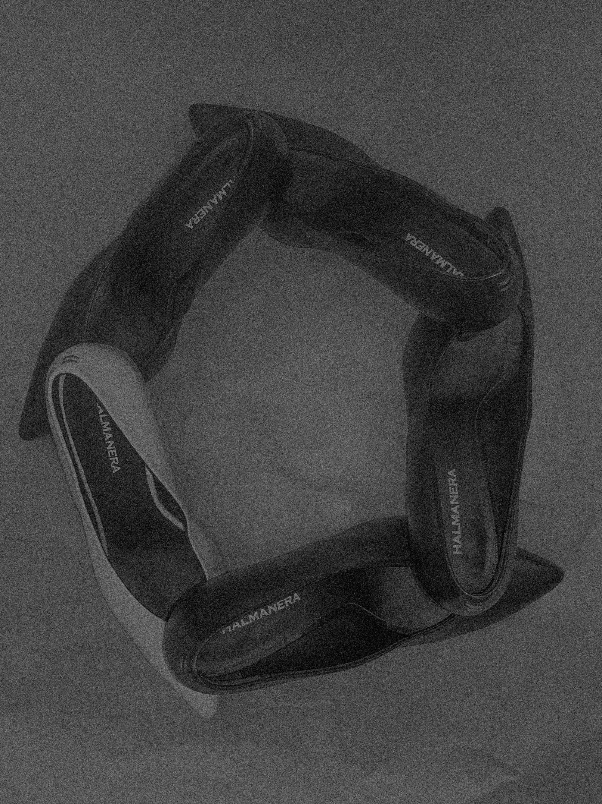 Interior of FORM by Idlewild OTR, featuring sculptural designer shoes and avant-garde fashion in Cincinnati.