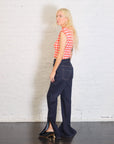 Fitted Stretch Flared Jeans with Side Slits in Indigo Rinse by A.W.A.K.E. Mode