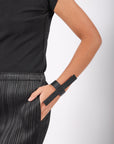 Line PS Cuff in Black by Aumorfia-Idlewild